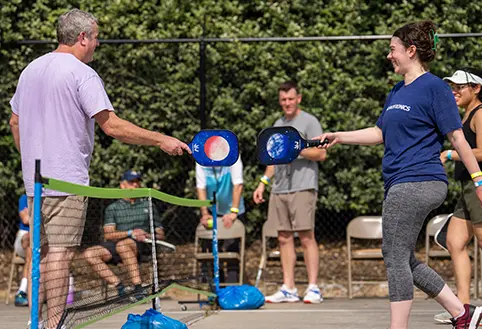 Nuvotronics employees playing pickle ball